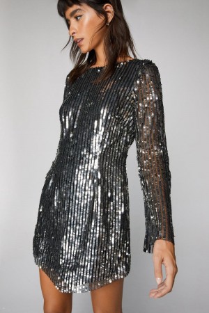 Šaty Nasty Gal All Over Sequin Asymmetric Hem Mini Stříbrné | CZ 7654-HYLNZ